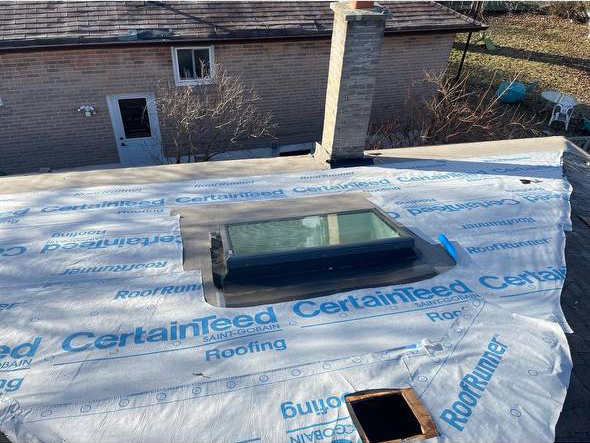 roof replacement before installation around skylight in Toronto