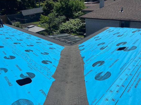 roof replacement before shingles with blue underlayment installation in Toronto