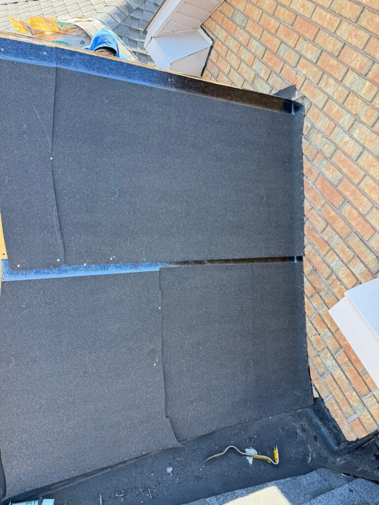roof repair in progress showing waterproofing and flashing installation in Toronto