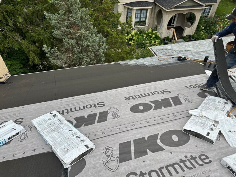 roof replacement process in Toronto showing new underlayment installation