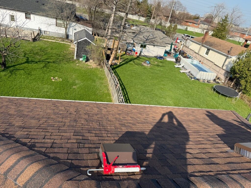 after roof repair project in Toronto with completed shingle installation and finished roofing system