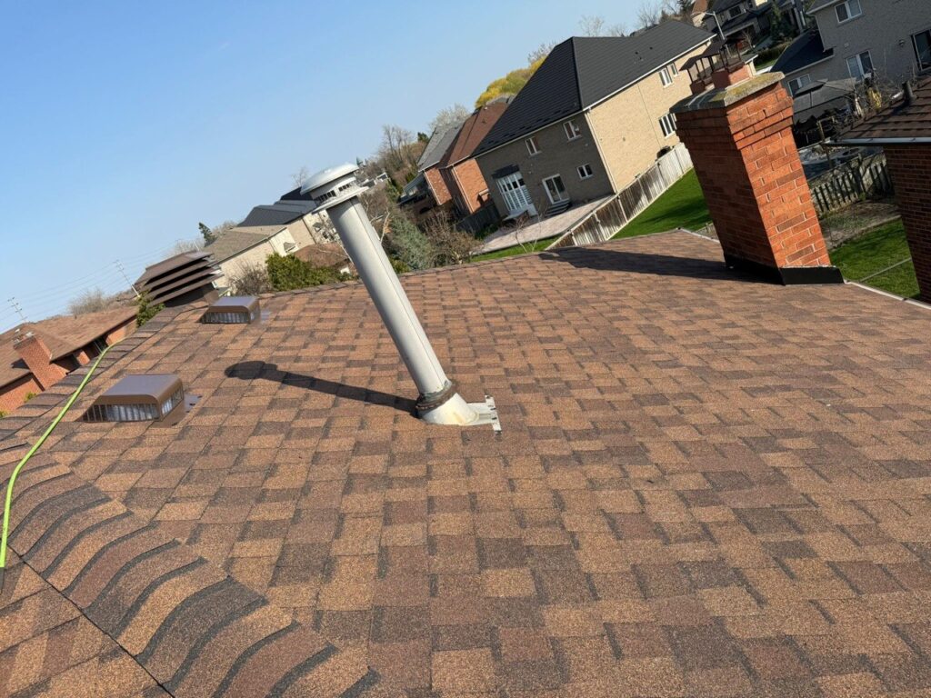 Completed roof repair with new shingles installed in North York