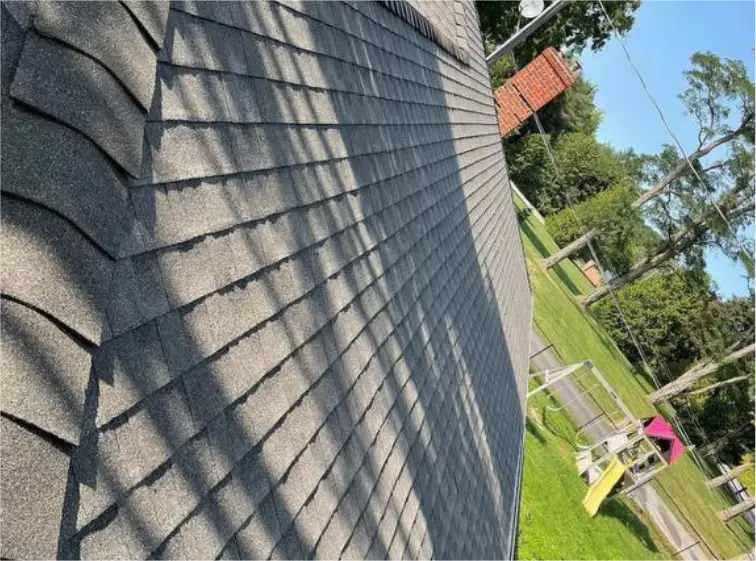 emergency roof repair in Oakville asphalt shingles close-up