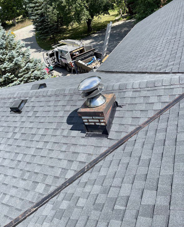 emergency roof replacement in Vaughan with new shingles and chimney area