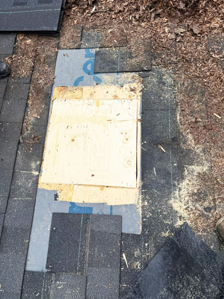 Removing damaged roof shingles in Toronto for repair