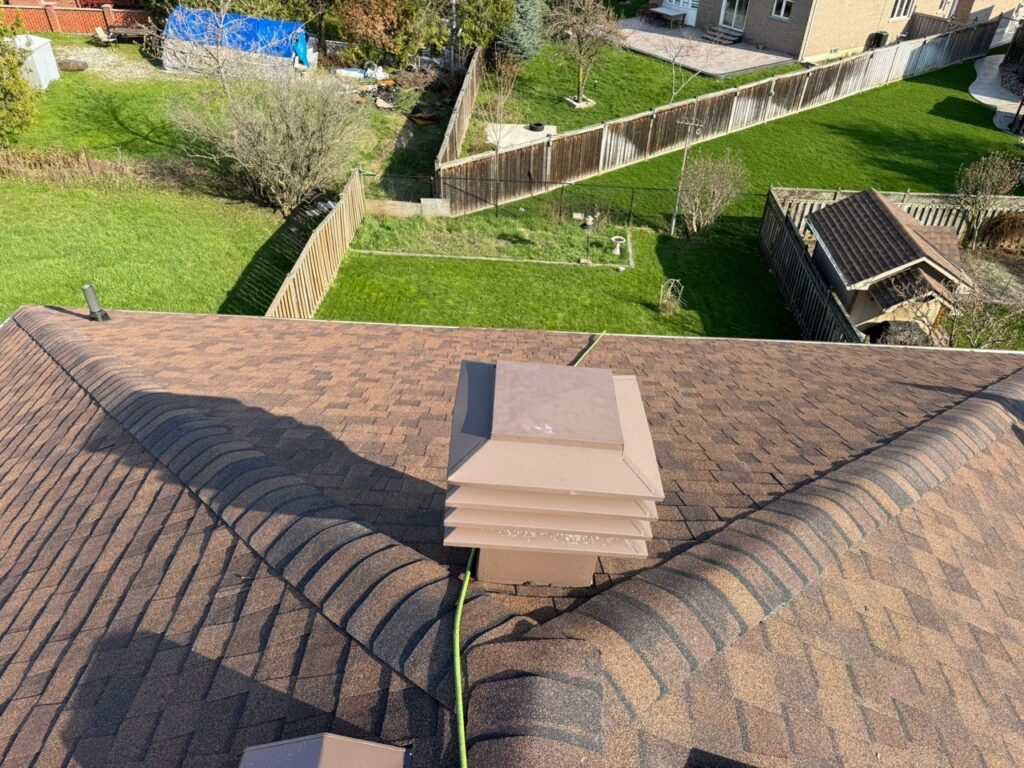 Completed roof vent installation in North York with new shingles and professionally installed roof vent for improved ventilation.