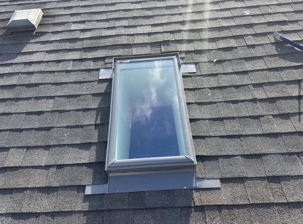 skylight installation and roof replacement in Etobicoke with asphalt shingles