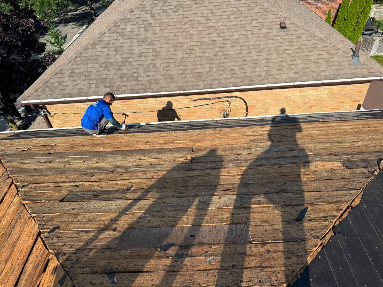 Damaged asphalt shingle roof before roof repair in Markham.