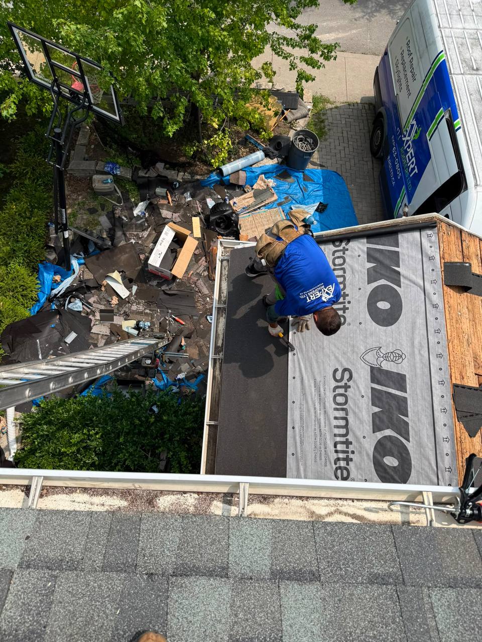 Professional roof repair in progress with new underlayment installation in Markham.